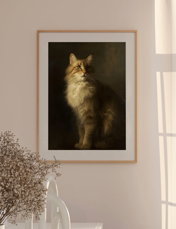 Framed portrait of a cat on a wall with a vase and plant in the foreground