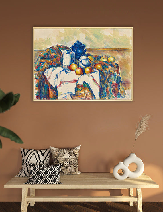 Framed painting on a wall above a wooden bench with decorative pillows and vases.