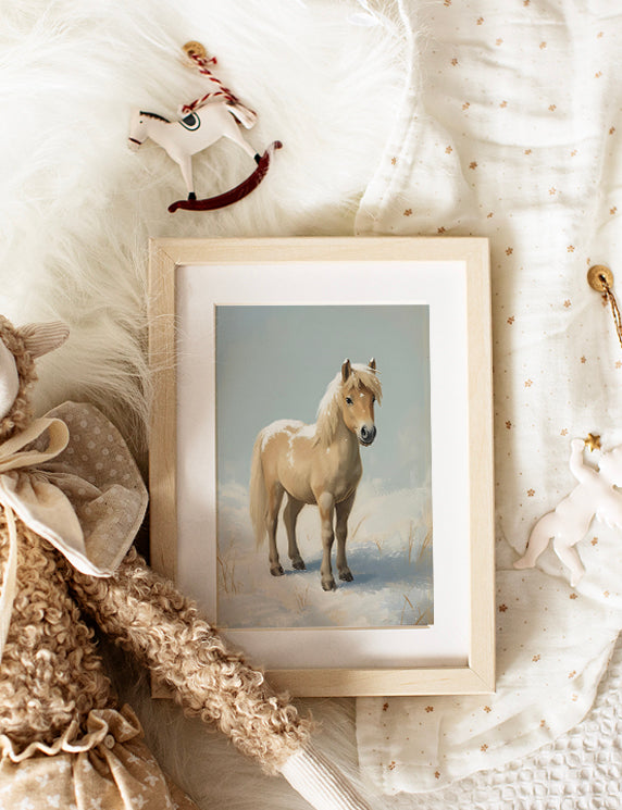 Winter Coat, Gentle Soul is a tender portrait of resilience and quiet grace. A small pony stands calmly in a snowy field, its thick winter coat dusted with snow and its long mane and tail catching the soft light.