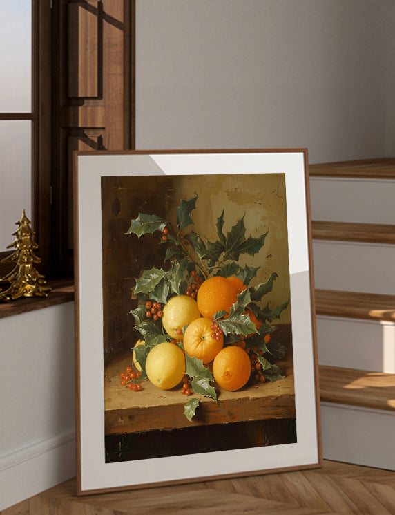 Framed still life painting of fruits and foliage on a wooden surface.