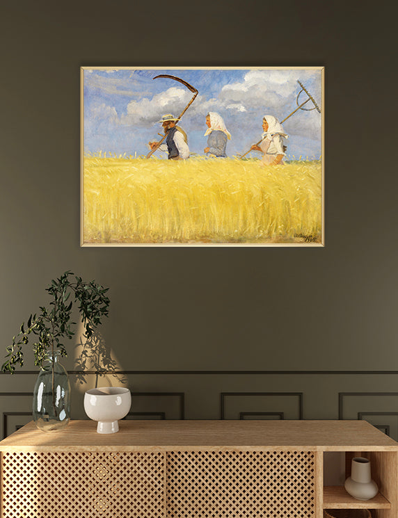 Framed painting of three people in a field with a scythe and rake, above a wooden cabinet.