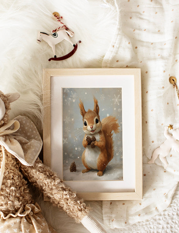 Framed picture of a squirrel on a soft, textured surface with decorative elements.