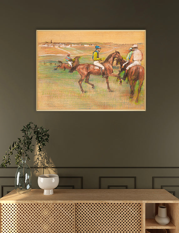 Artistic depiction of horse racing on a wall above a wooden cabinet.