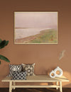 Framed landscape painting on a brown wall above a wooden bench with decorative pillows and vases.
