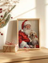 Framed picture of Santa Claus with a dog next to a wrapped gift on a wooden surface.