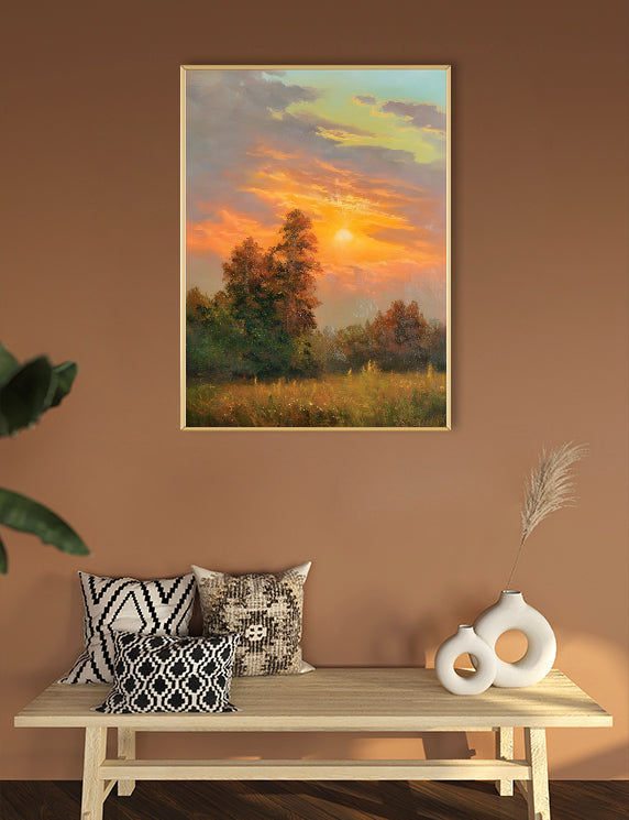 Framed landscape painting on a wall above a wooden bench with decorative pillows and vases.