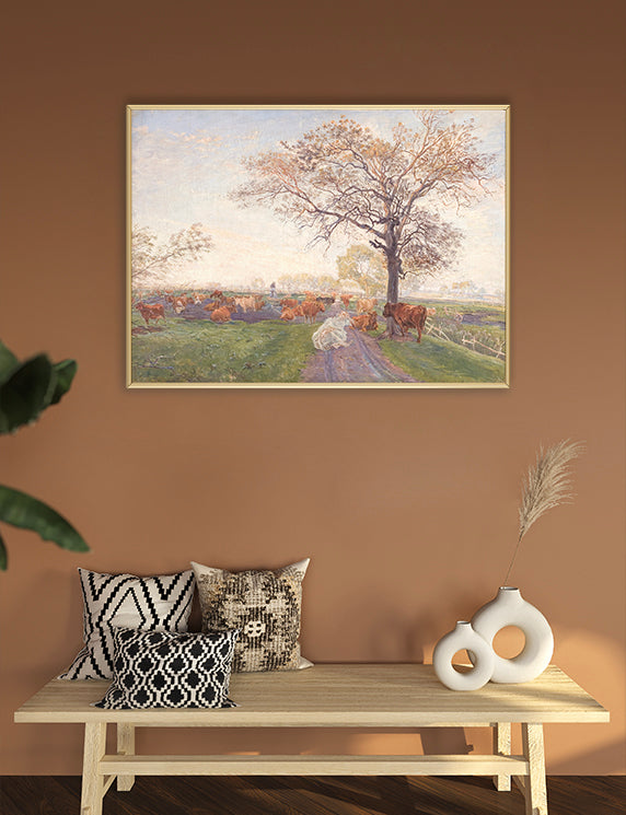 Framed landscape painting above a wooden bench with decorative pillows and vases.